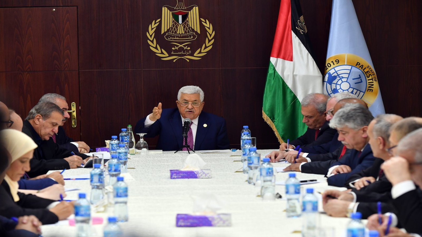 RAMALLAH, WEST BANK - APRIL 13: (----EDITORIAL USE ONLY  MANDATORY CREDIT - "THAER GHANAIM / PALESTINIAN PRESIDENCY / HANDOUT" - NO MARKETING NO ADVERTISING CAMPAIGNS - DISTRIBUTED AS A SERVICE TO CLIENTS----) Palestinian President Mahmoud Abbas (C) holds the first cabinet meeting with the newly announced government at the Presidential Office in Ramallah, West Bank on April 13, 2019. Fatah Movement Central Committee member Muhammad Shtayyeh announced his new cabinet today alongside president Mahmud Abbas. (Photo by Thaer Ghanaim / Palestinian Presidency / Handout/Anadolu Agency/Getty Images)
