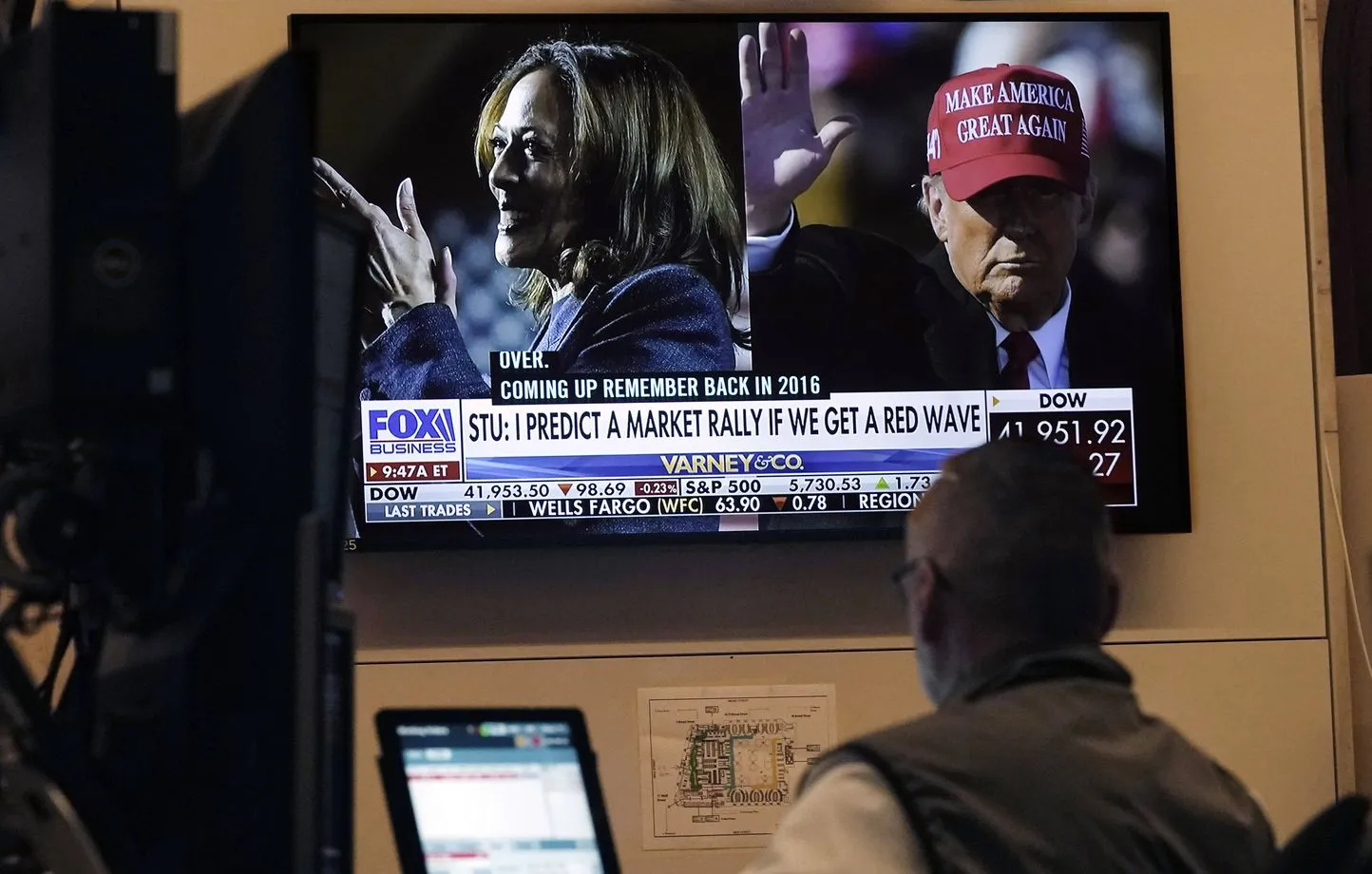 1444x920 a screen on the floor of the new york stock exchange monday nov 4 2024 shows a broadcast talking about kamala harris and donald trump ap photo richard drew nyrd103 24309570971220 2411041718