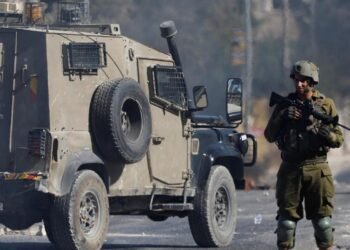 Members of the Israeli security forces stand during clashes following the funeral of seven-year-old Palestinian boy Rayyan Suleiman, who according to his father has died of heart failure while being chased by Israeli soldiers, east of Bethlehem, Israeli-occupied West Bank September 30, 2022. REUTERS/Mussa Qawasma