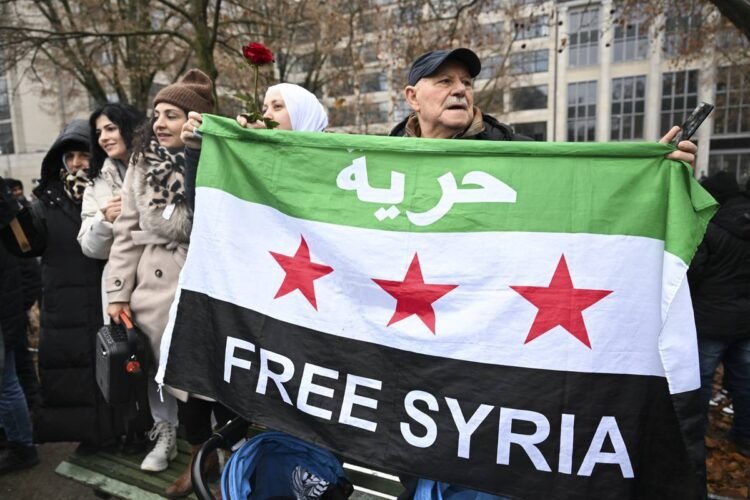 AA 20241208 36425777 36425767 SYRIANS LIVING IN GERMANY CELEBRATE THE COLLAPSE OF 61YEAR OF BAATH PARTY RULE IN SYRIA