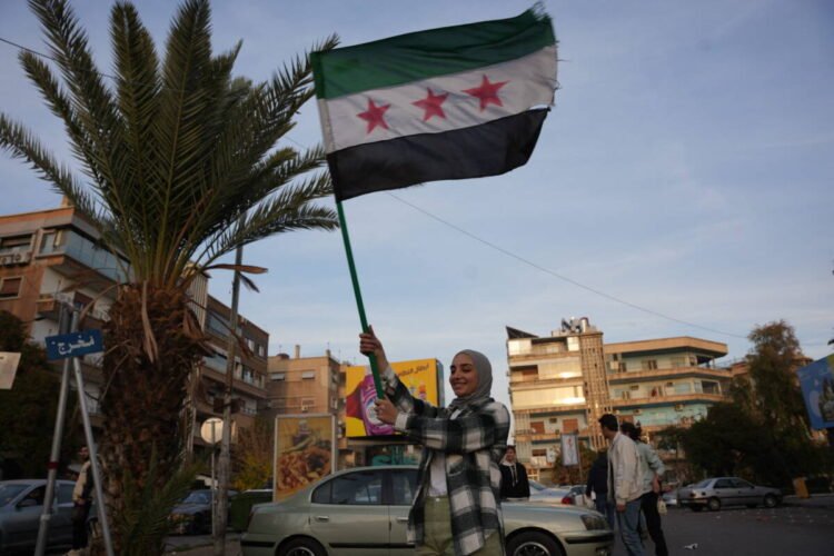 AFP 20241210 alsayed notitle241210 npwwT v1 HighRes SyriansCelebrateTheFallOfTh scaled 1
