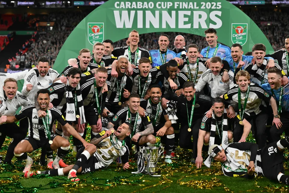 newcastle uniteds players celebrate trophy 980372537