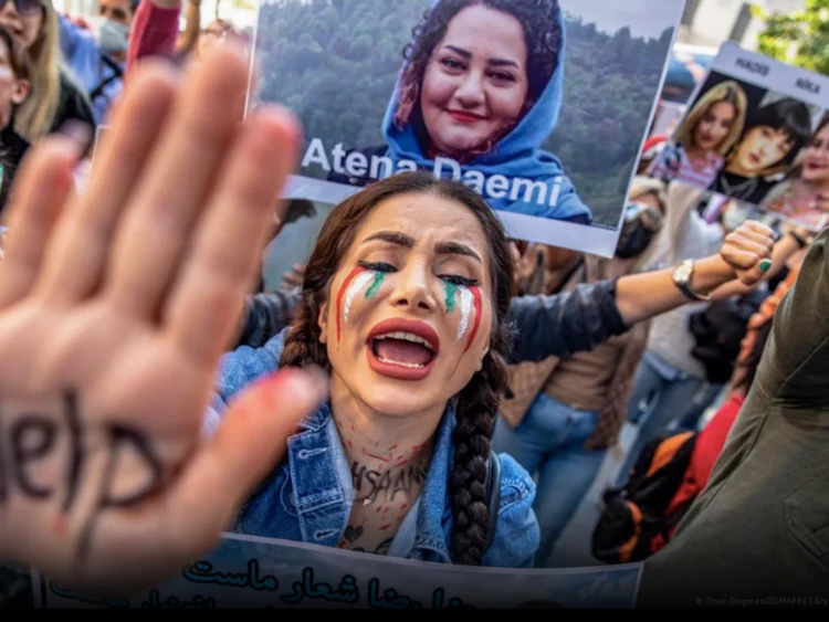 photo of woman holding up hand that says help