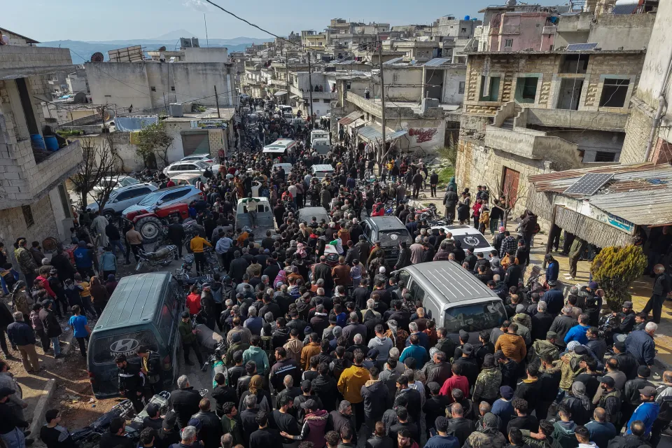 relatives neighbours attend funeral procession 978262580
