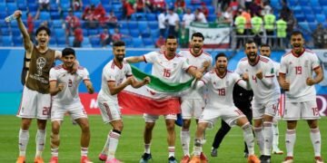 Iran's players celebrate at the end of the Russia 2018 World Cup Group B football match between Morocco and Iran at the Saint Petersburg Stadium in Saint Petersburg on June 15, 2018. (Photo by CHRISTOPHE SIMON / AFP) / RESTRICTED TO EDITORIAL USE - NO MOBILE PUSH ALERTS/DOWNLOADS        (Photo credit should read CHRISTOPHE SIMON/AFP/Getty Images)