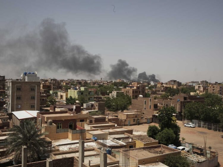 Smoke is seen in Khartoum, Sudan, Saturday, April 22, 2023. The fighting in the capital between the Sudanese Army and Rapid Support Forces resumed after an internationally brokered cease-fire failed. (AP Photo/Marwan Ali)
