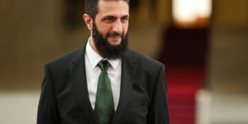 (FILES) A handout picture released by Syria's transitional government shows the country's new leader Ahmed al-Sharaa waiting for the arrival of Spain's foreign minister at the presidential palace in Damascus on January 16, 2025. Syria's new authorities announced on January 29, 2025, that Ahmed al-Sharaa, who took the helm after longtime ruler Bashar al-Assad's ouster last month, was appointed interim president and tasked with forming a transitional legislature, state media reported. (Photo by Syria's Transitional Government / AFP) / RESTRICTED TO EDITORIAL USE - MANDATORY CREDIT "AFP PHOTO /SYRIA'S TRANSITIONAL GOVERNMENT  " - NO MARKETING NO ADVERTISING CAMPAIGNS - DISTRIBUTED AS A SERVICE TO CLIENTS