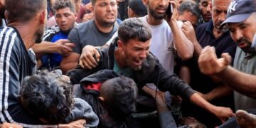 SENSITIVE MATERIAL. THIS IMAGE MAY OFFEND OR DISTURB Palestinians react next to people wounded in an Israeli strike while waiting for aid, according to the Gaza Health Ministry, at Nasser hospital, in Khan Younis, southern Gaza Strip, June 17, 2025. REUTERS/Hatem Khaled     TPX IMAGES OF THE DAY