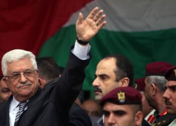 Palestinian President Mahmoud Abbas gestures as he speaks during a rally supporting the Palestinian UN bid for observer state status