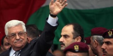 Palestinian President Mahmoud Abbas gestures as he speaks during a rally supporting the Palestinian UN bid for observer state status