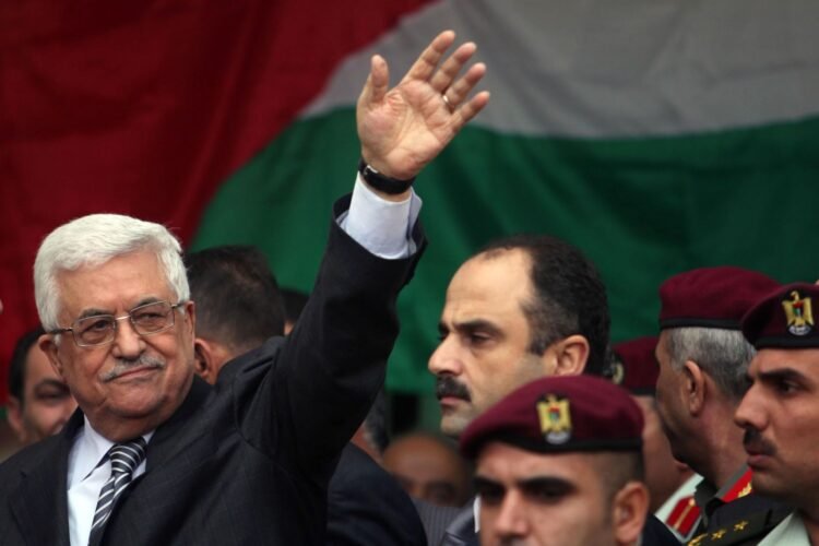 Palestinian President Mahmoud Abbas gestures as he speaks during a rally supporting the Palestinian UN bid for observer state status