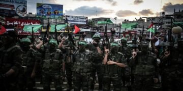 GAZA CITY, GAZA - AUGUST 21: Members of Ezzedin al-Qassam Brigades, the armed wing of the Hamas movement, take part in a military parade marking the one-year death anniversary of three al-Qassam commanders Raed al-Attar, Mohammed Abu Shamala, and Mohammed Barhoum on August 21, 2015 in Rafah town, southern Gaza Strip. (Photo by Ali Hassan/Anadolu Agency/Getty Images)